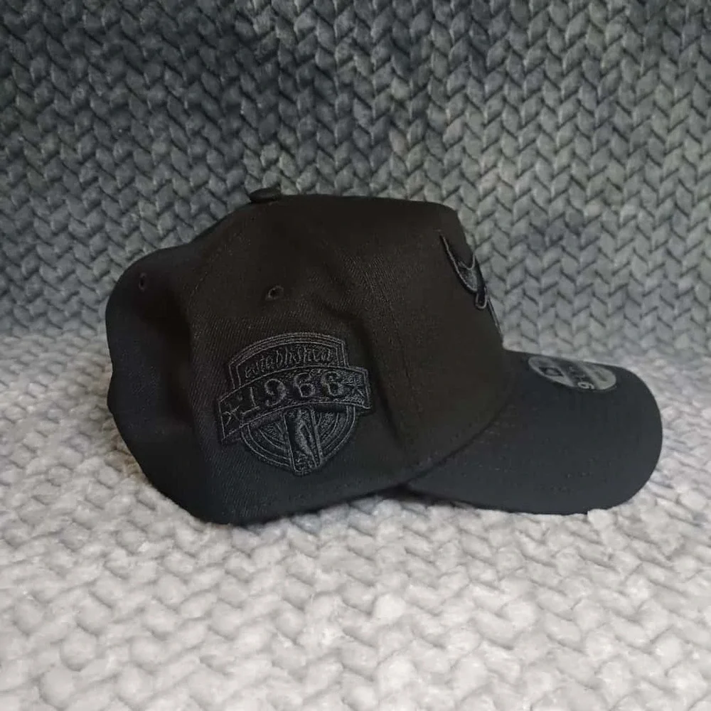 New Era Mens Chicago Bulls Snapback Hat Black On Black 9FORTY One Size Fits Most